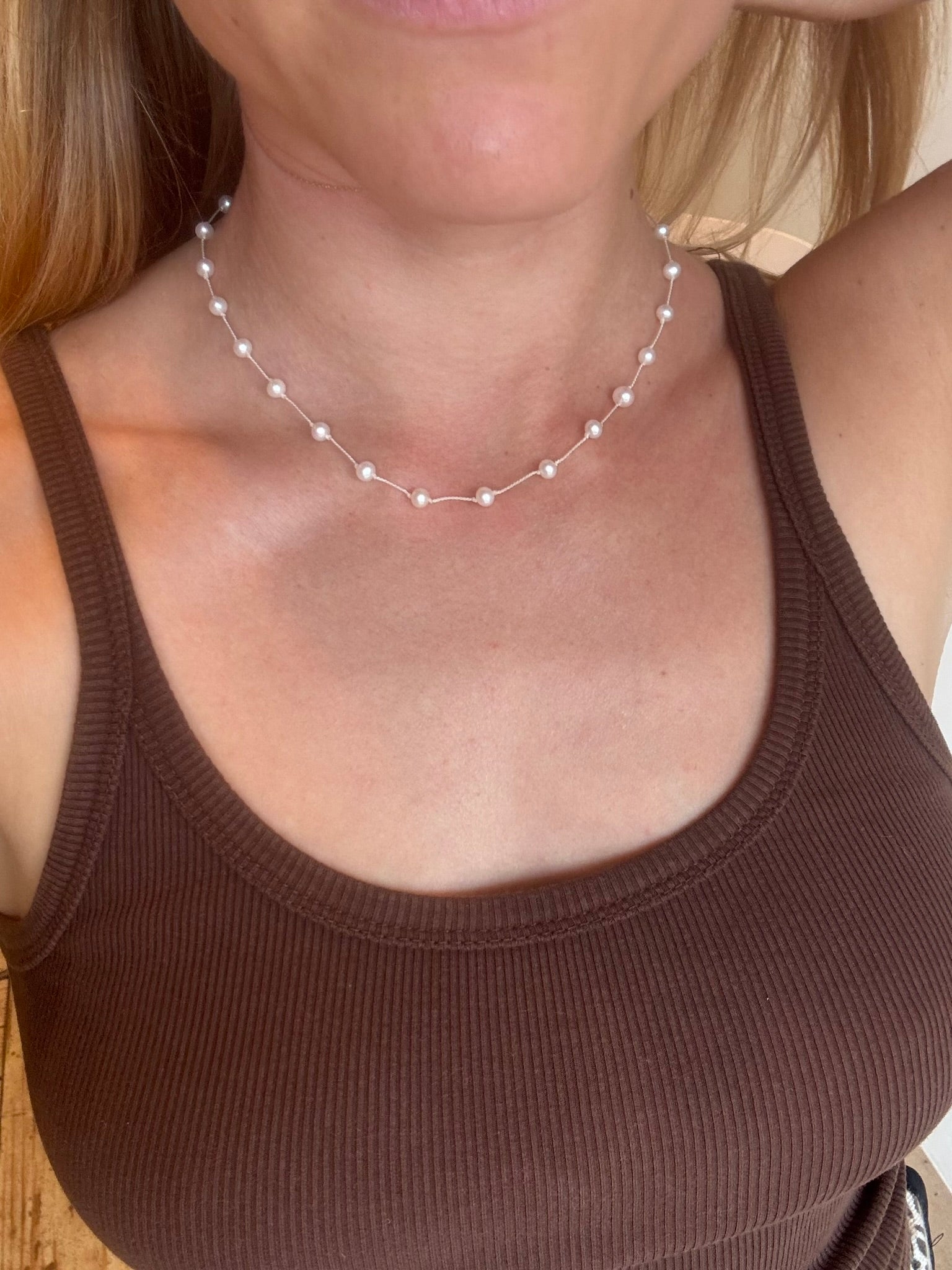 Pearls hand knotted on silk
