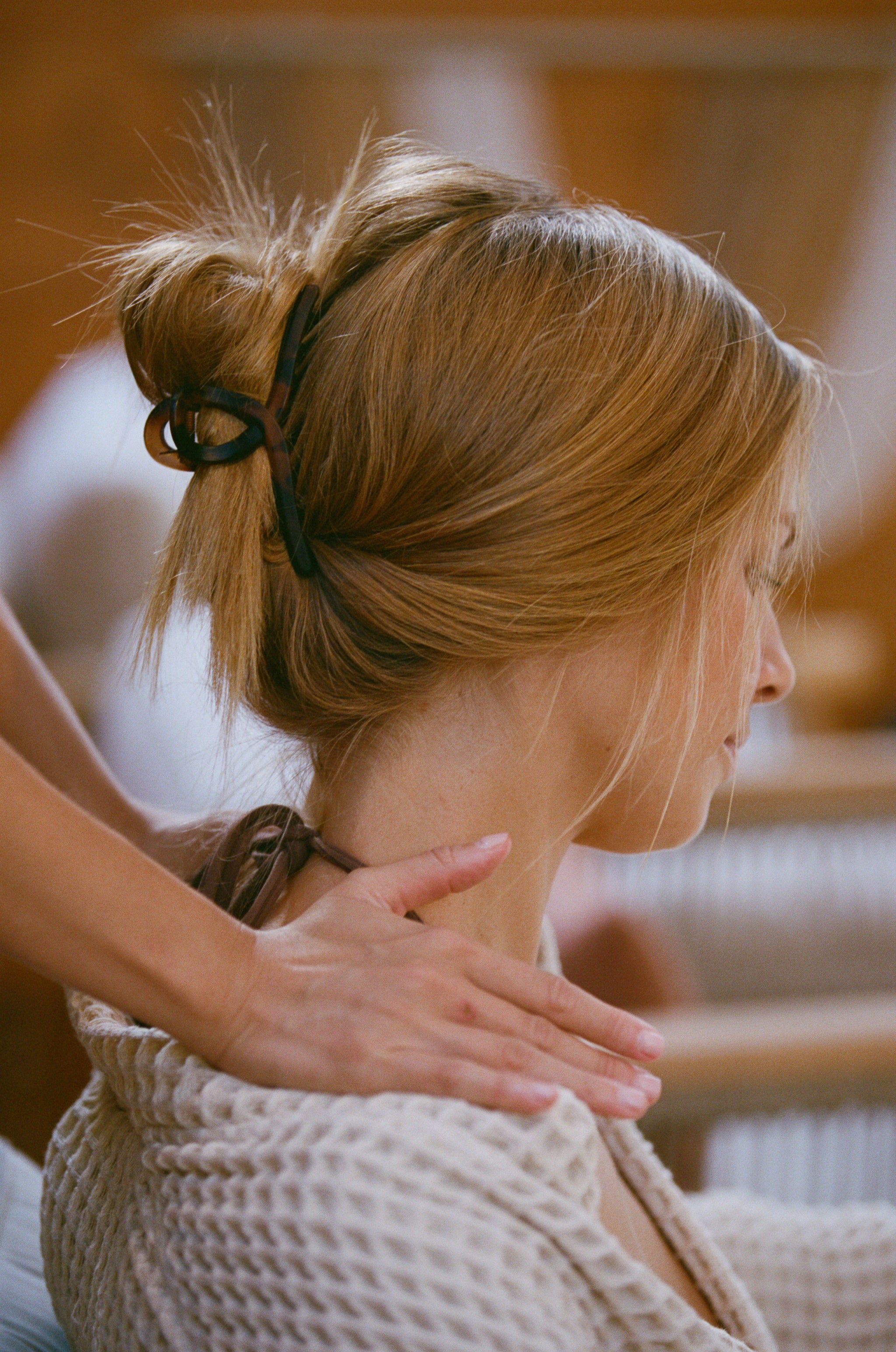 Person receiving a massage with blurred background